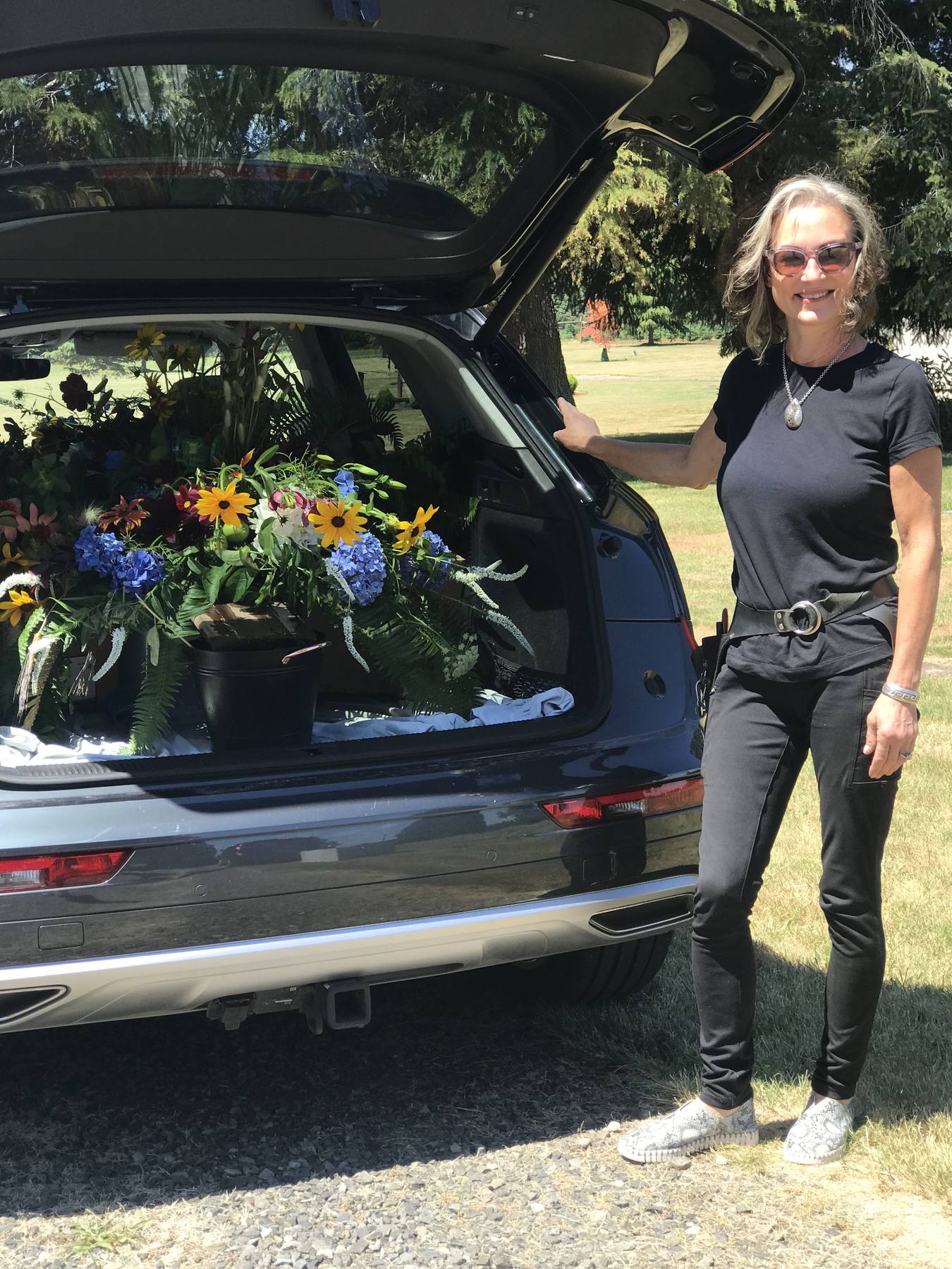 Sonia delivering farewell flowers