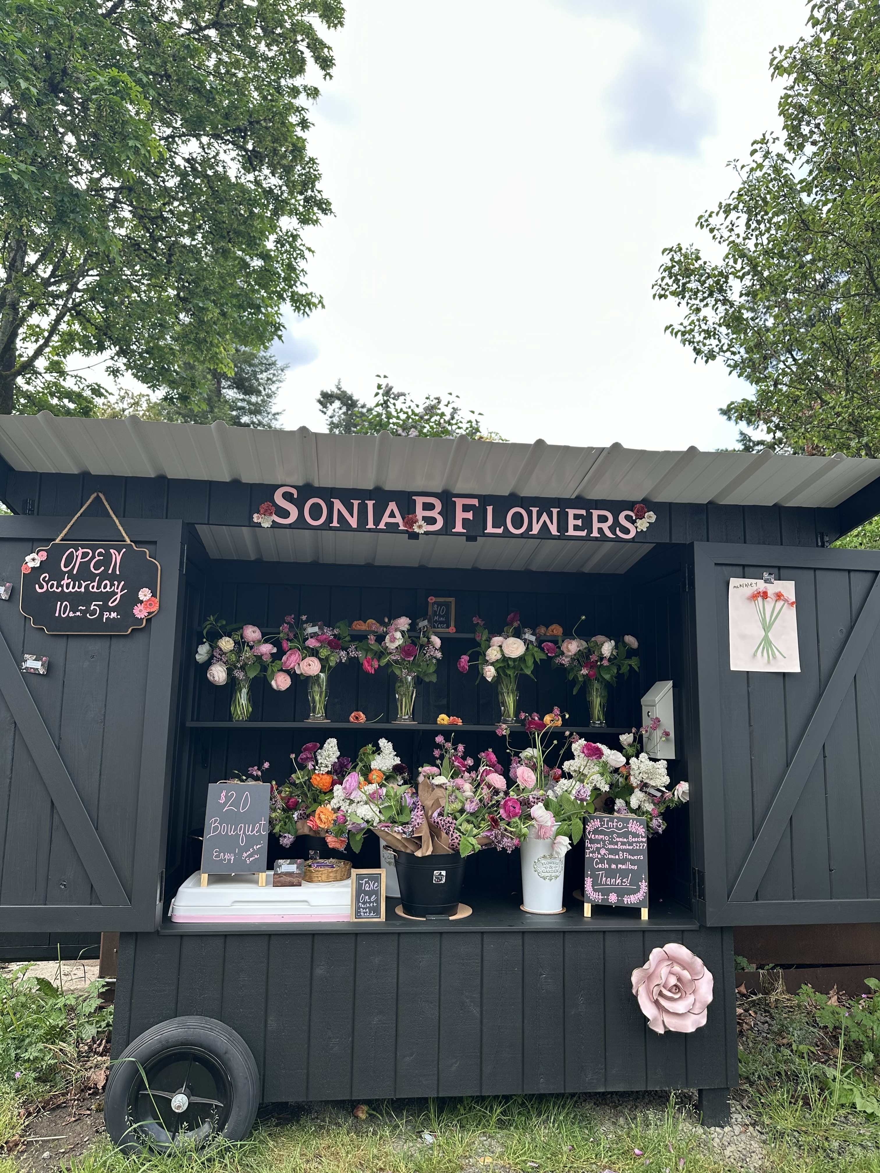 Sonia B Flowers cart filled with seasonal bouquets
