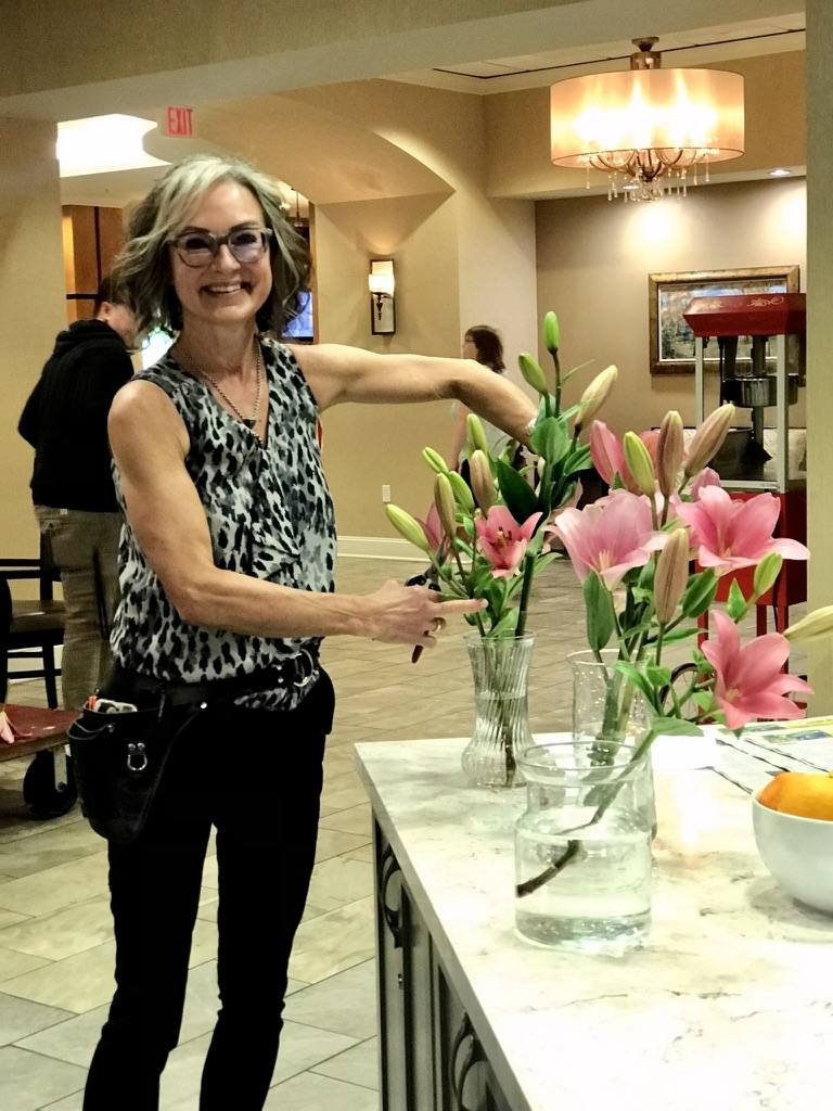 Sonia teaching with lilies